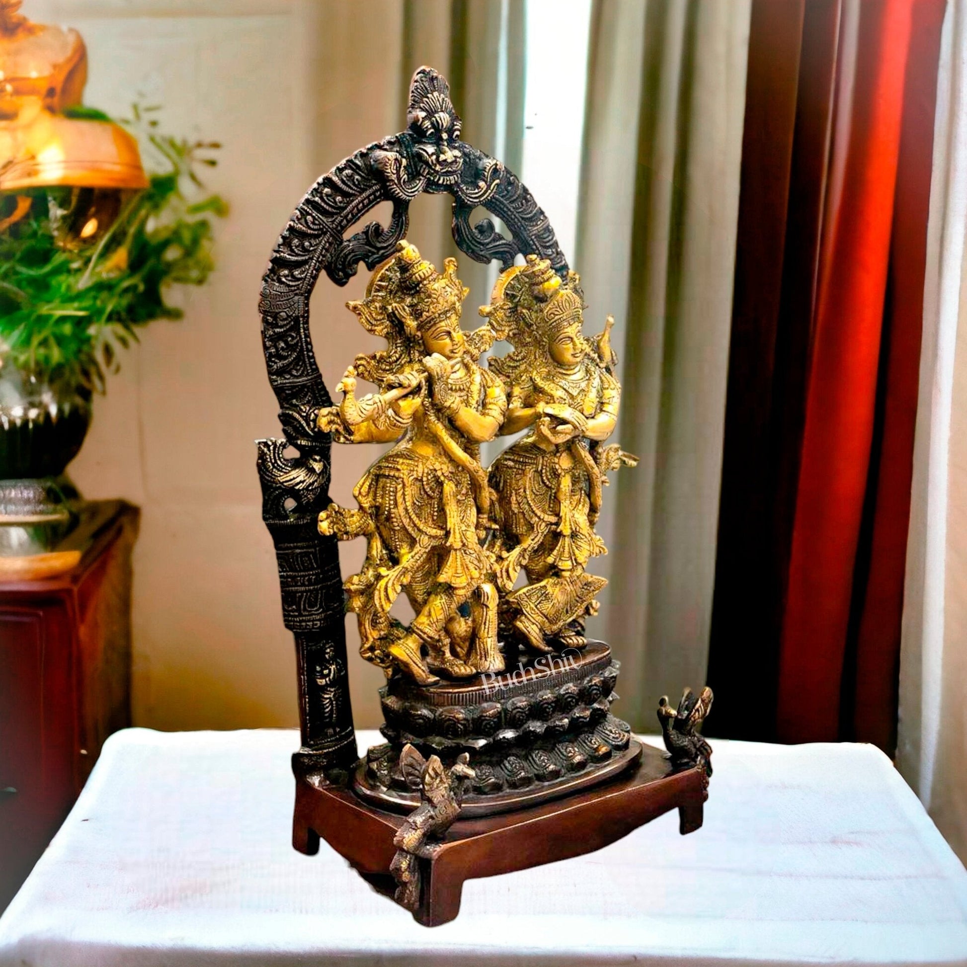 Sacred 17.5-Inch Brass Radha Krishna Idol Pair with Peacock Adorned Base