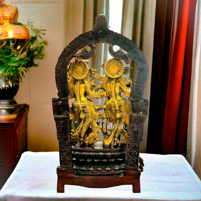 Sacred 17.5-Inch Brass Radha Krishna Idol Pair with Peacock Adorned Base