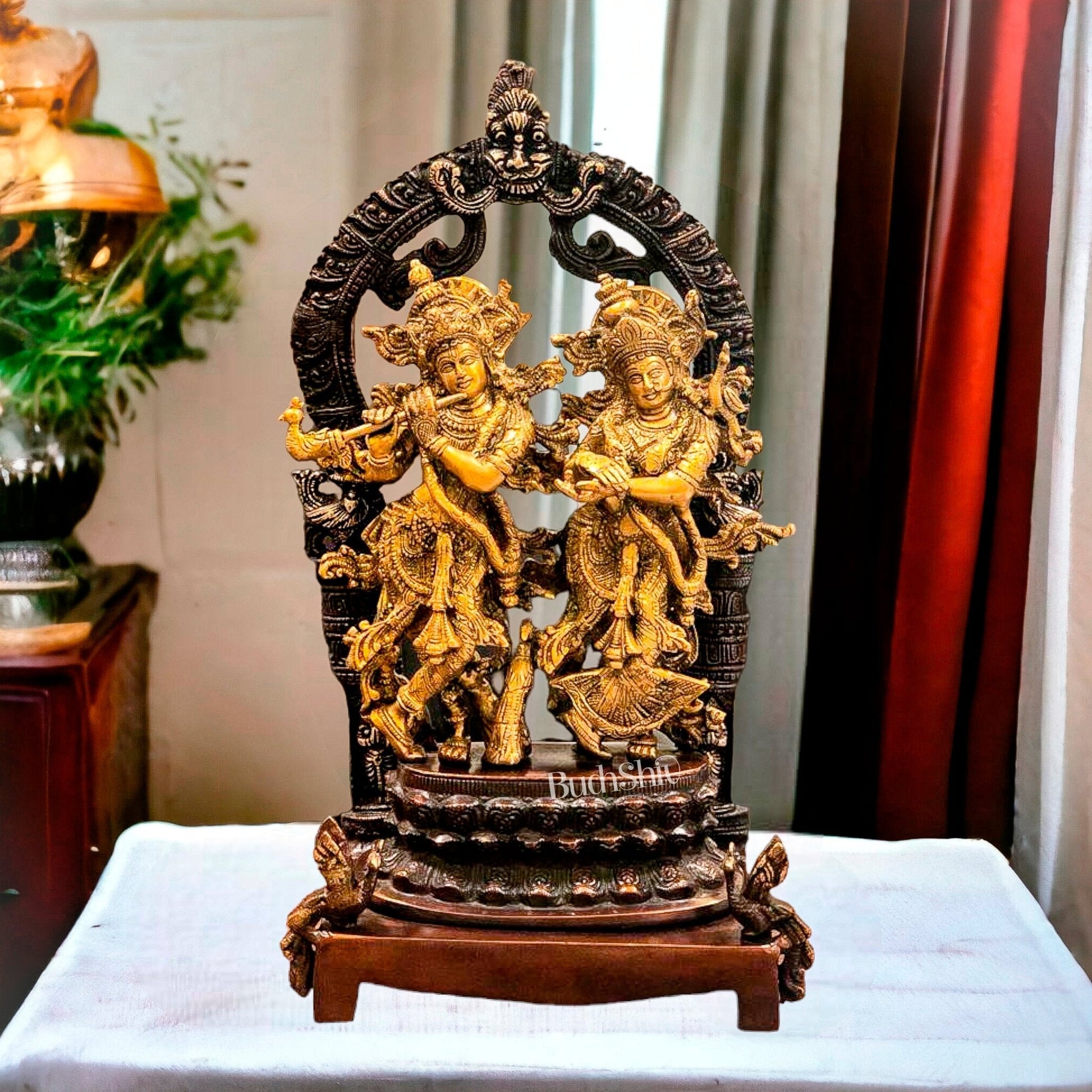 Sacred 17.5-Inch Brass Radha Krishna Idol Pair with Peacock Adorned Base