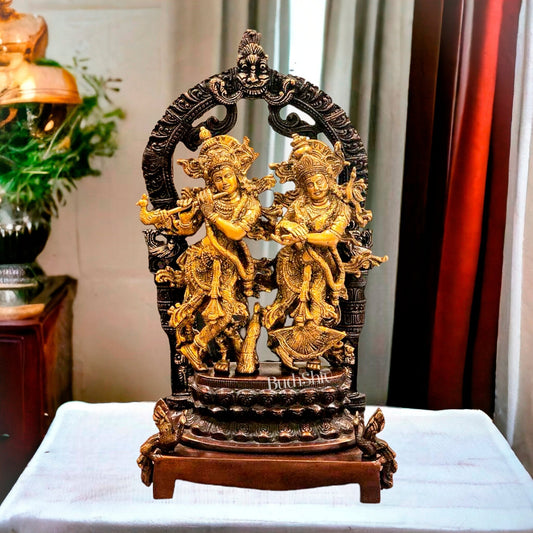 Sacred 17.5-Inch Brass Radha Krishna Idol Pair with Peacock Adorned Base