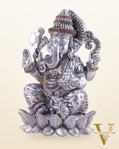 Silver plated Brass Superfine Intricately Carved Small Right trunk Ganesha Idol - 5" Tall
