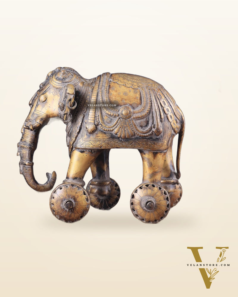 Vintage Brass Elephant Statue with Functional Wheels 13"