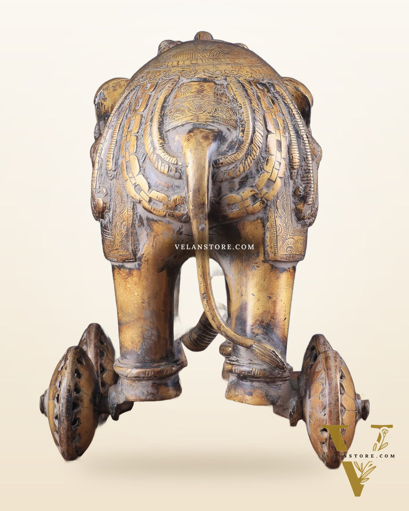 Vintage Brass Elephant Statue with Functional Wheels 13"