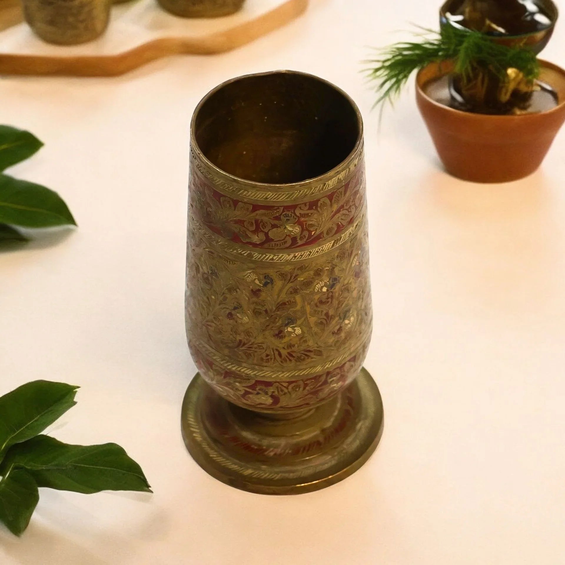 vintage brass glass with unique carving design