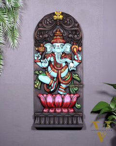 Wooden Ganesha Dancing on Lotus Motif – Vertical Wall Hanging Panel