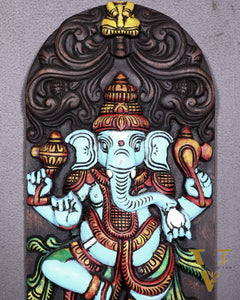 Wooden Ganesha Dancing on Lotus Motif – Vertical Wall Hanging Panel