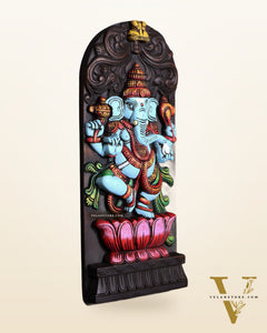 Wooden Ganesha Dancing on Lotus Motif – Vertical Wall Hanging Panel