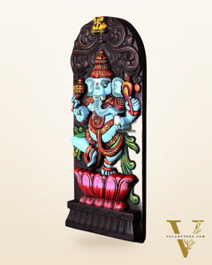 Wooden Ganesha Dancing on Lotus Motif – Vertical Wall Hanging Panel